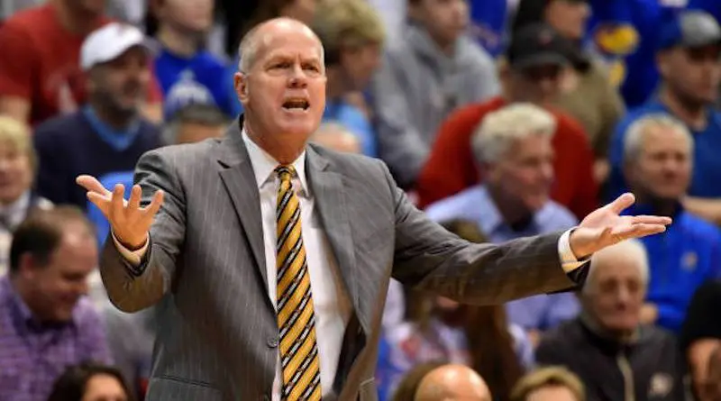 Colorado coach Tad Boyle reacts to a foul on the Buffs against Kansas