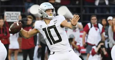 Justin Herbert in white