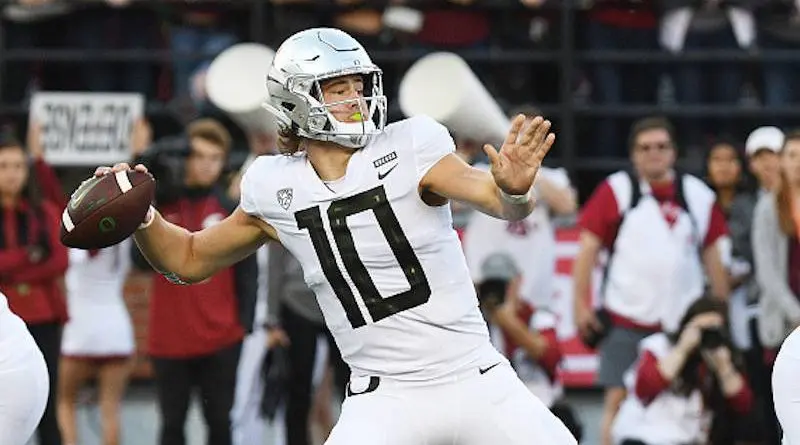 Justin Herbert in white