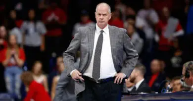 tad boyle cu standing sidelines