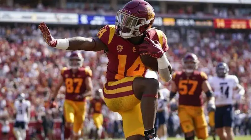 brown usc heisman pose