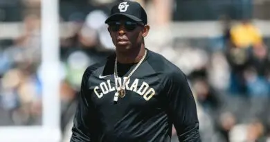 deion sanders in colorado shirt and hat