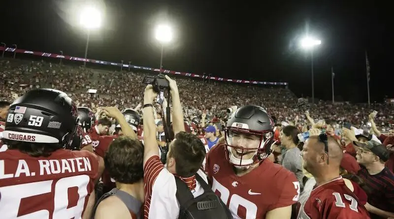 wsu football celebrates after 2023 wisconsin victory