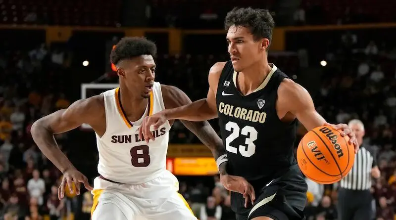 Colorado forward Tristan da Silva (23) drives on Arizona State forward Alonzo Gaffney during their game Saturday in Tempe, Ariz.