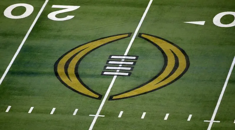 College Football Playoff logo on the field