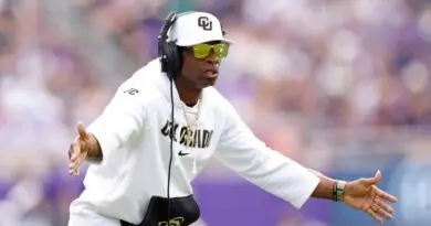 Colorado football coach Deion Sanders on the sideline.