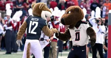 Oregon State and Washington State mascots Benny and Butch.