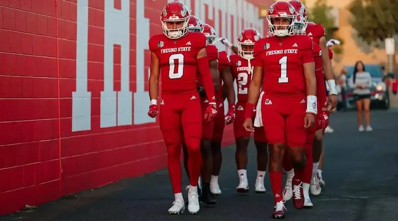 Fresno State football players walking