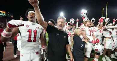 Utah coach Kyle Whittingham and Utes celebrating