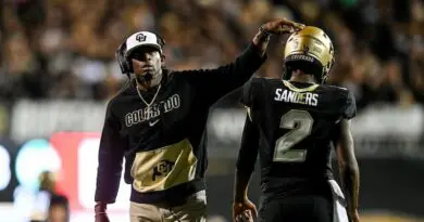 Colorado coach Deion Sanders and his son-quarterback Shedeur Sanders