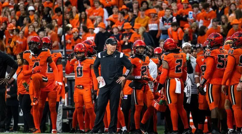 Oregon State football team on the sidelines in 2023