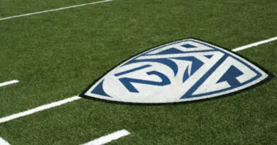 Pac-12 conference logo on a football field