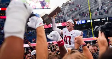 WSU quarerback John Mateer celebrates after defeating Washington in the Apple Cup on Saturday