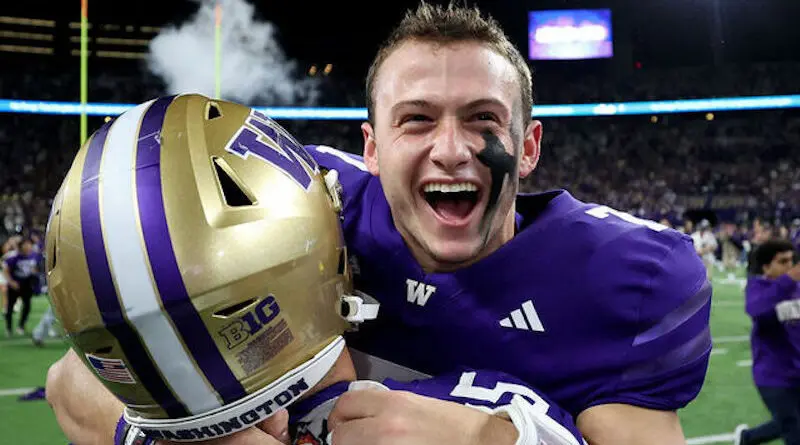 Washington quarterback Will Rogers celebrates the Husky win over Michigan in 2024