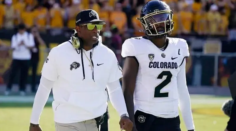 Colorado coach Deion Sanders and Buffs quarterback Shedeur Sanders in 2024