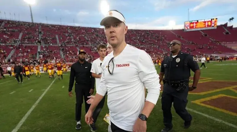 USC football head coach Lincoln Riley is under pressure to turn around the Trojans amid key losses to the Transfer Portal