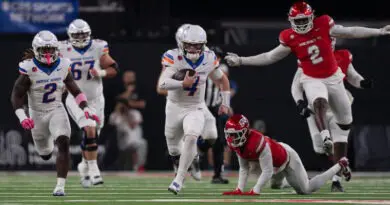 Boise State quarterback Maddux Madsen rushes against UNLV in their first meeting