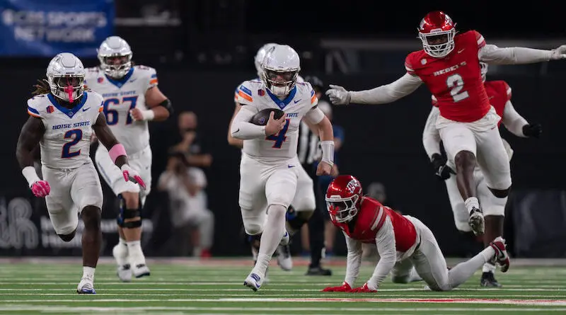 Boise State quarterback Maddux Madsen rushes against UNLV in their first meeting