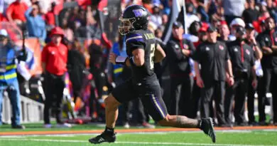 EL PASO, TEXAS - DECEMBER 31: Quarterback Demond Williams Jr. #2 of the Washington Huskies runs for a touchdown against the Louisville Cardinals during the first half of the Tony the Tiger Sun Bowl at Sun Bowl Stadium on December 31, 2024 in El Paso, Texas. The Cardinals defeated the Huskies 35-34.