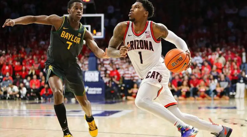 Caleb Love drives to the basket late in the second half to maintain a double digit lead against Baylor on Jan. 15 in McKale Center.