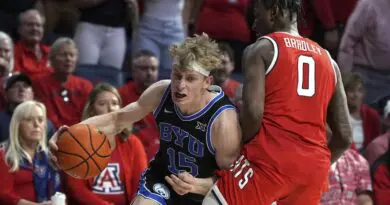 Richie Saunders hit two free-throws with 3.2 seconds left to defeat No. 19 Arizona