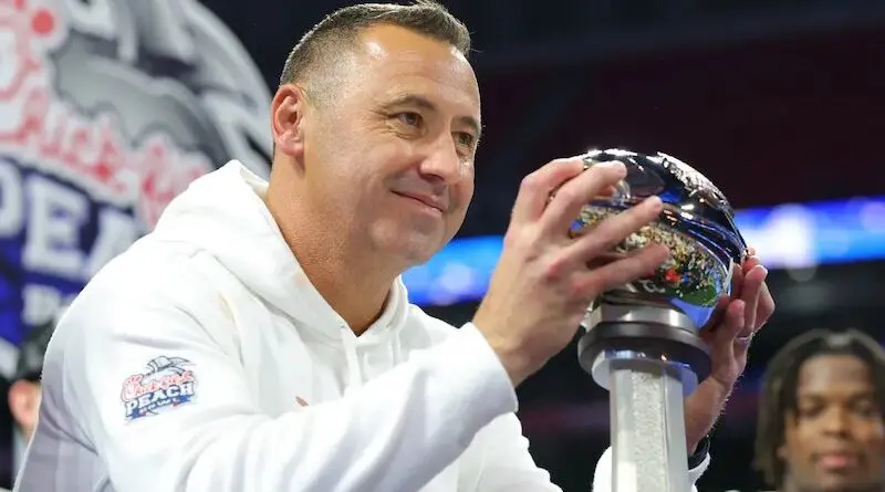 Texas football head coach Steve Sarkisian celebrates after winning the Peach Bowl in 2025