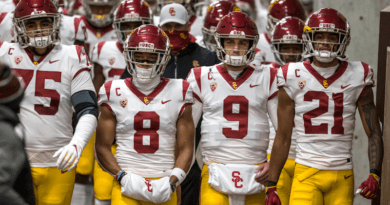 USC football team coming out of the tunnel