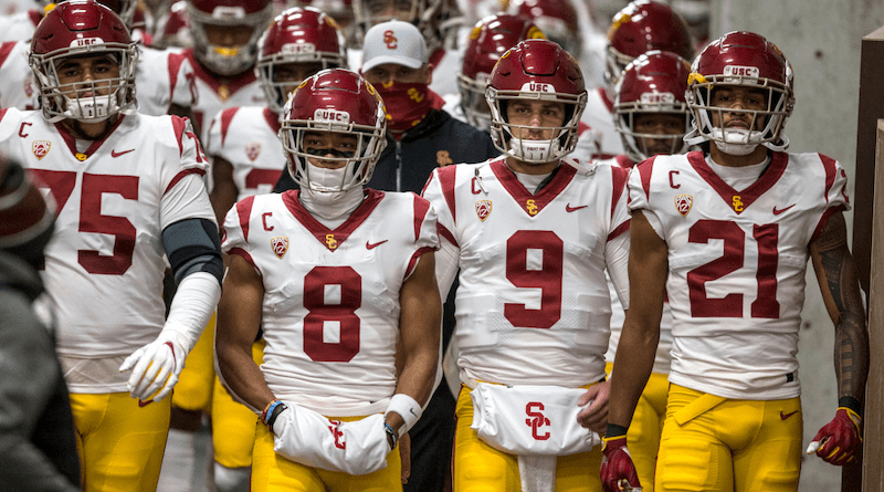 USC football team coming out of the tunnel