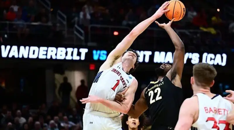 Saint Mary's center Harry Wessels blocks a shot vs Vanderbilt