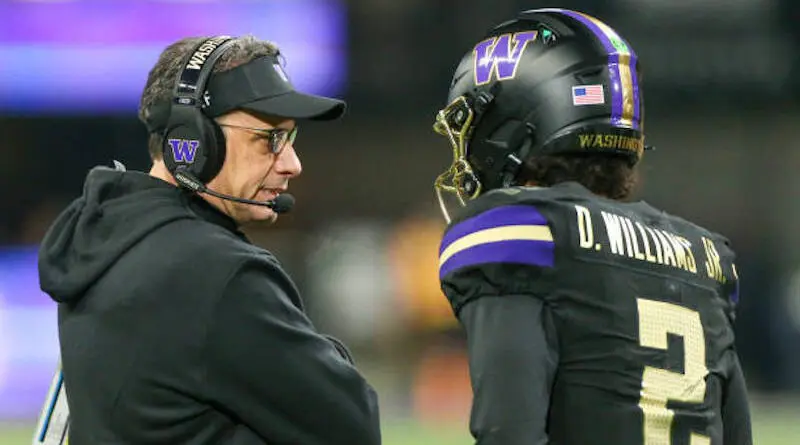 Washington football head coach Jedd Fisch with Husky QB Demond Williams Jr.