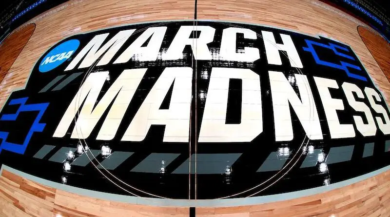March Madness branding near the court before a first-round college basketball game on March 23, 2024 in South Bend, Ind.