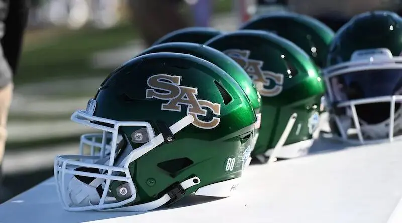Green Sacramento State football helmets