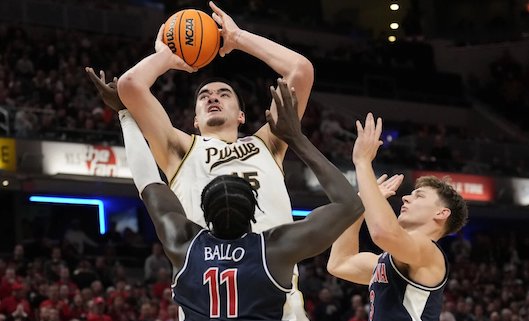 Purdue center Zach Eddy (15) shoots over Arizona center Omar Ballo (11) in the second half. | AJ Mast/AP