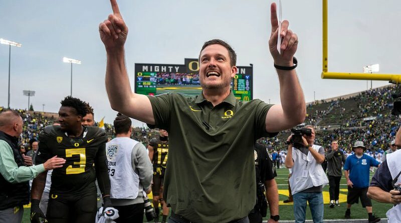 Oregon football coach Dan Lanning celebrates after defeating BYU at Autzen Stadium in 2023.