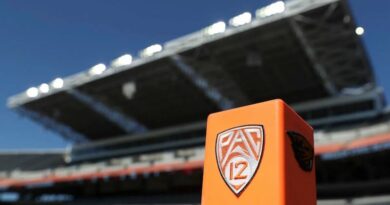 Pac-12 logo on football field pylon