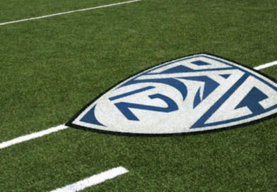 Pac-12 conference logo on a football field