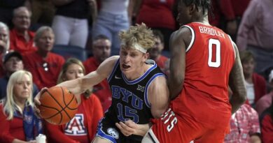 Richie Saunders hit two free-throws with 3.2 seconds left to defeat No. 19 Arizona