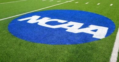 NCAA logo on football field