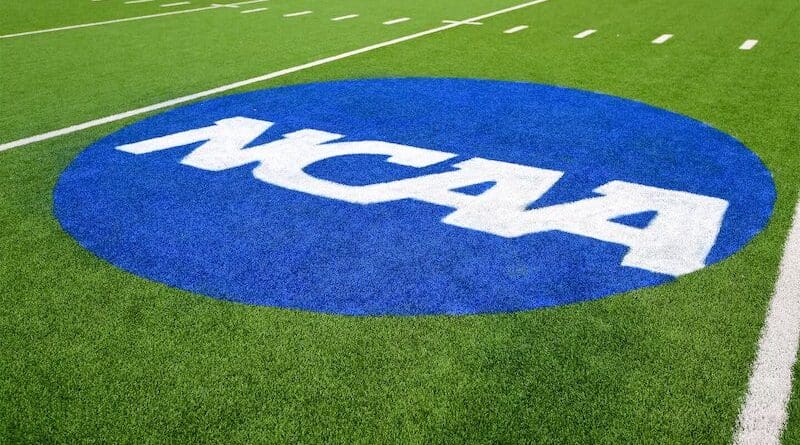 NCAA logo on football field