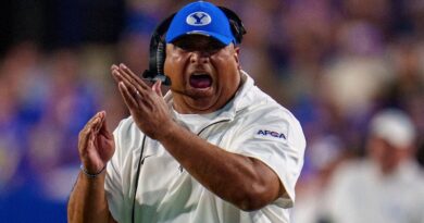 BYU coach Kalani Sitake calling a timeout