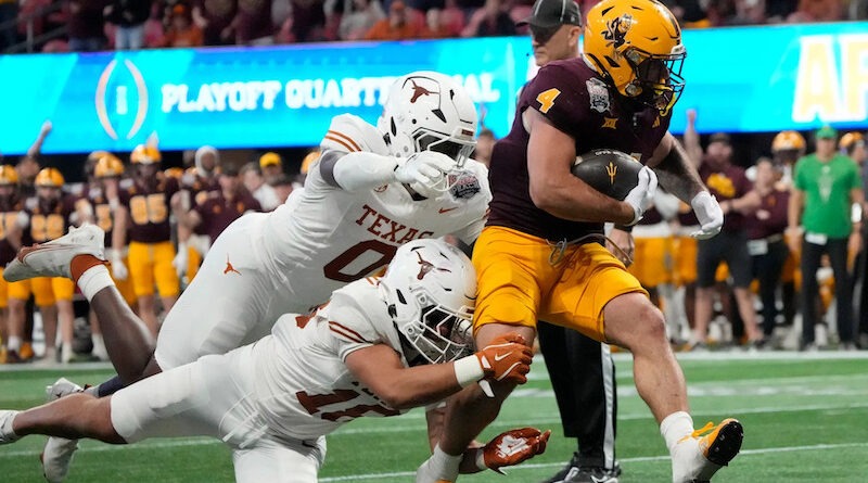 Arizona State running back Cam Skattebo carries the ball vs. Texas in 2024-25 CFP