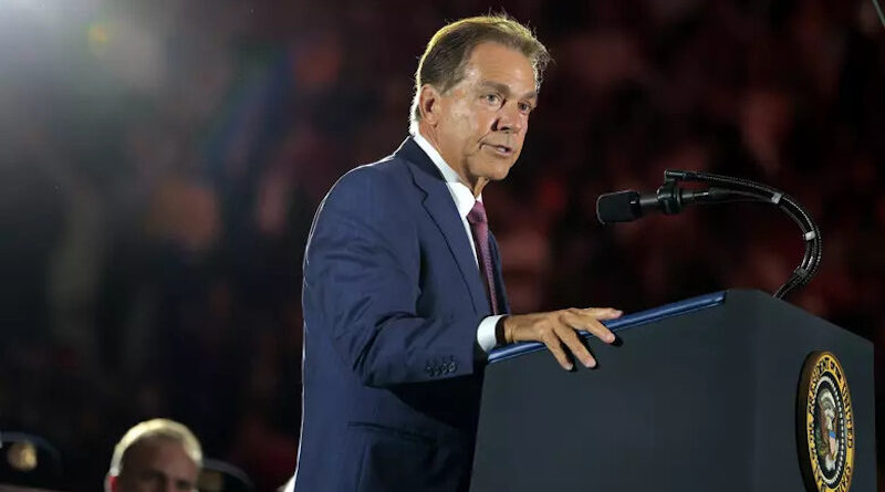 Former Alabama football head coach Nick Saban speaking at the presidential podium.