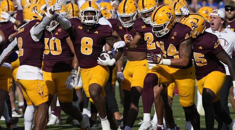 Arizona State Football players celebrating in the Big 12 Championship game in 2024