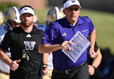 Jedd Fisch runs out of tunnel at Washington