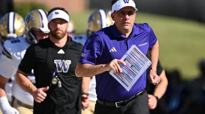 Jedd Fisch runs out of tunnel at Washington