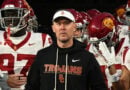 Lincoln Riley and Trojans in tunnel in 2025