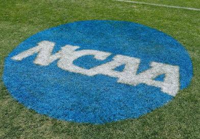 McLaughlin: New ‘5-in-5’ Rule Good for College Sports? NCAA logo on football field