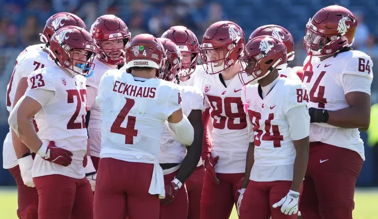 Washington State football huddle in 2025